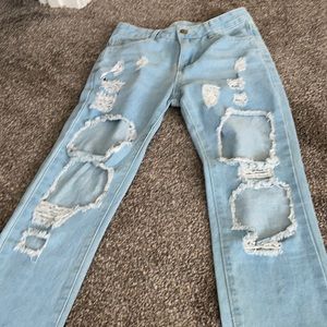 Size S. No stretch. Skinny Jean with holes.